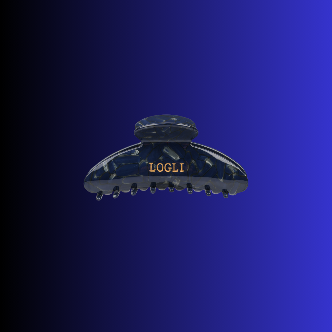 Navy hair clip with 'LOGLI' branding on a blue background