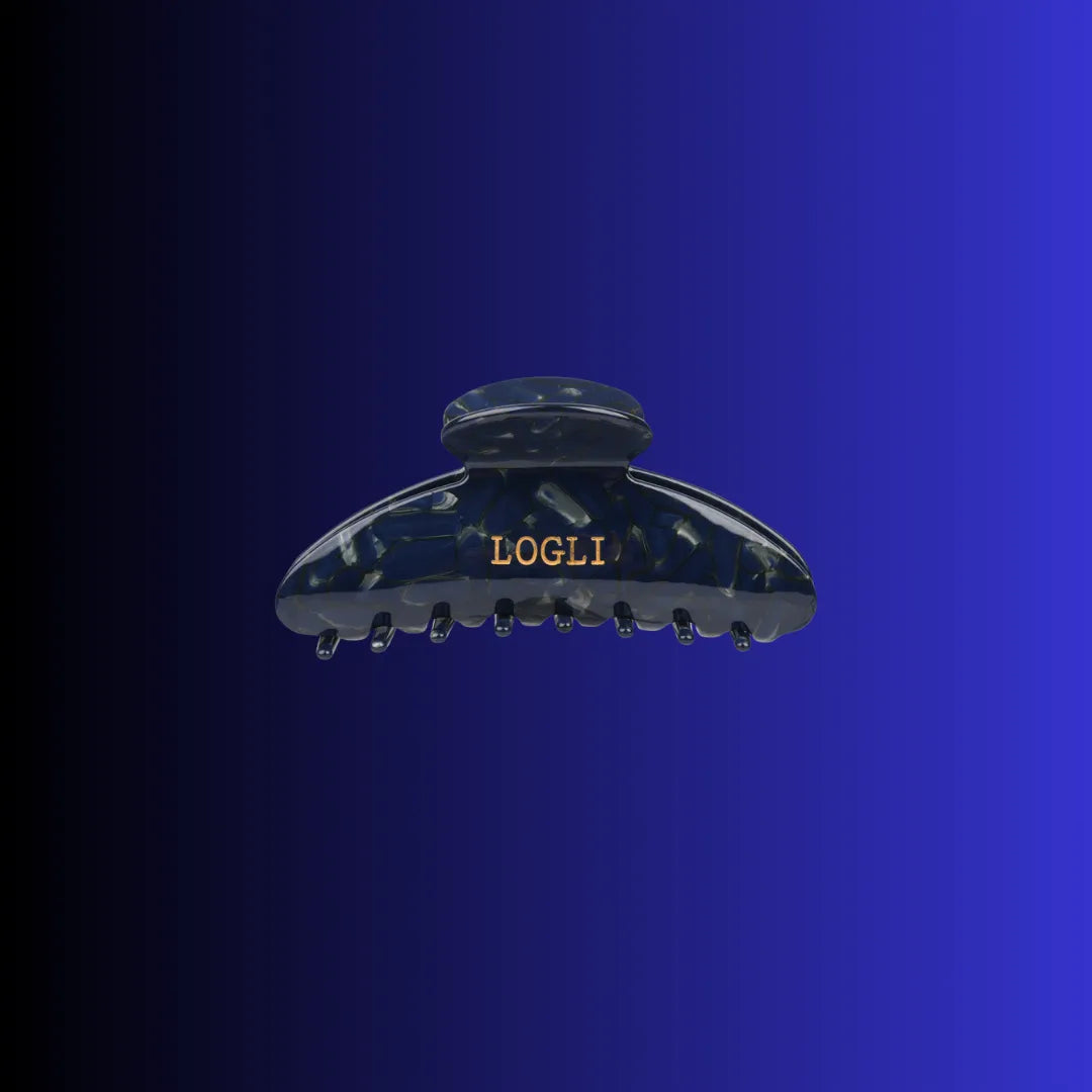 Navy hair clip with 'LOGLI' branding on a blue background