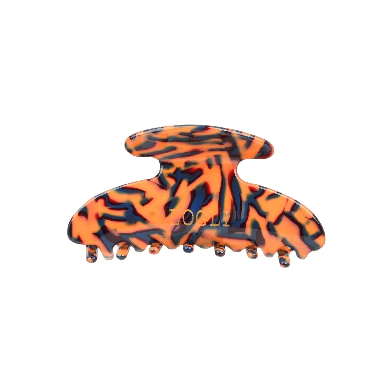 Orange and black patterned hair clip on a white background