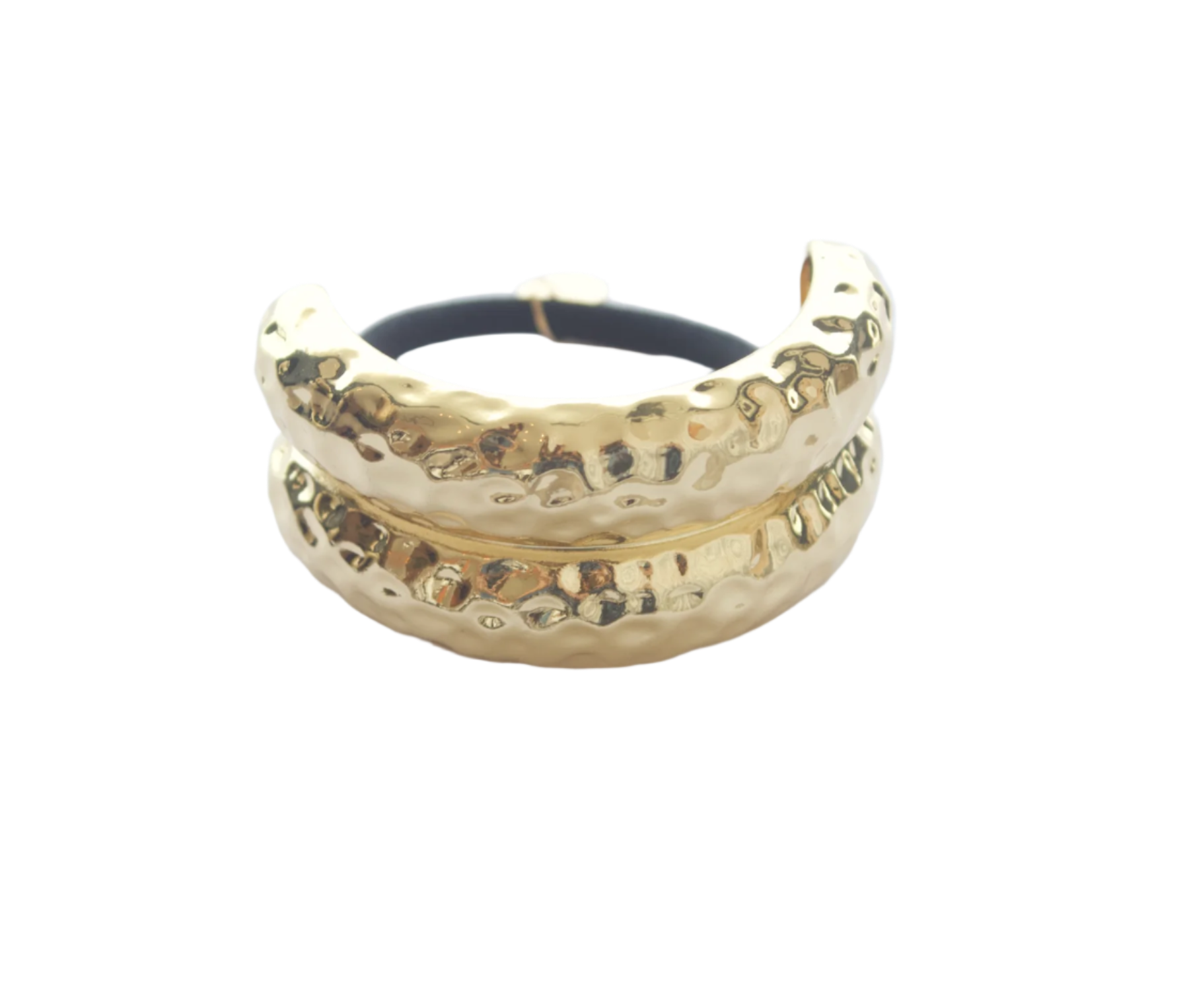 Gold metal hairband with textured surface on a white background