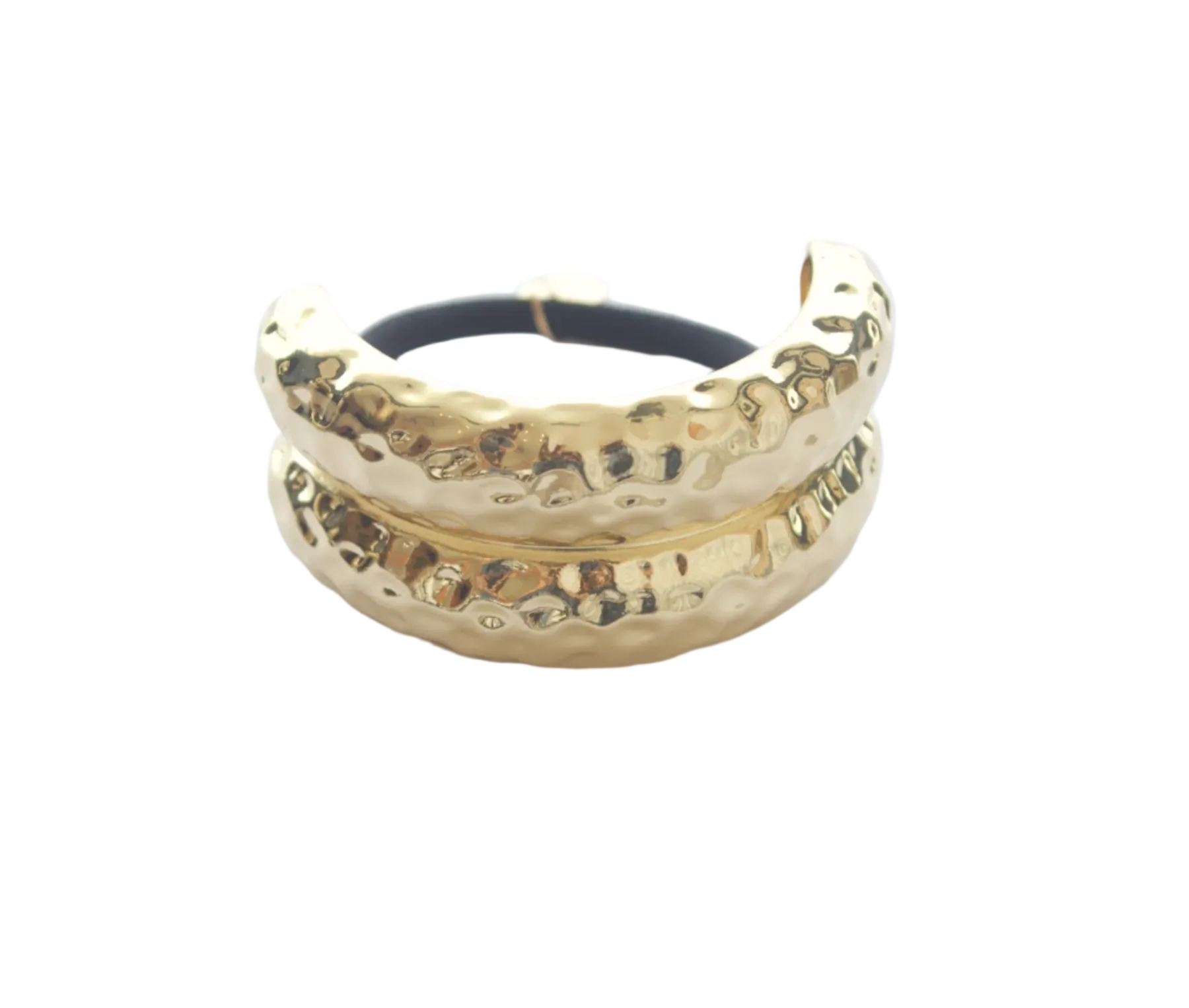 Gold metal hairband with textured surface on a white background