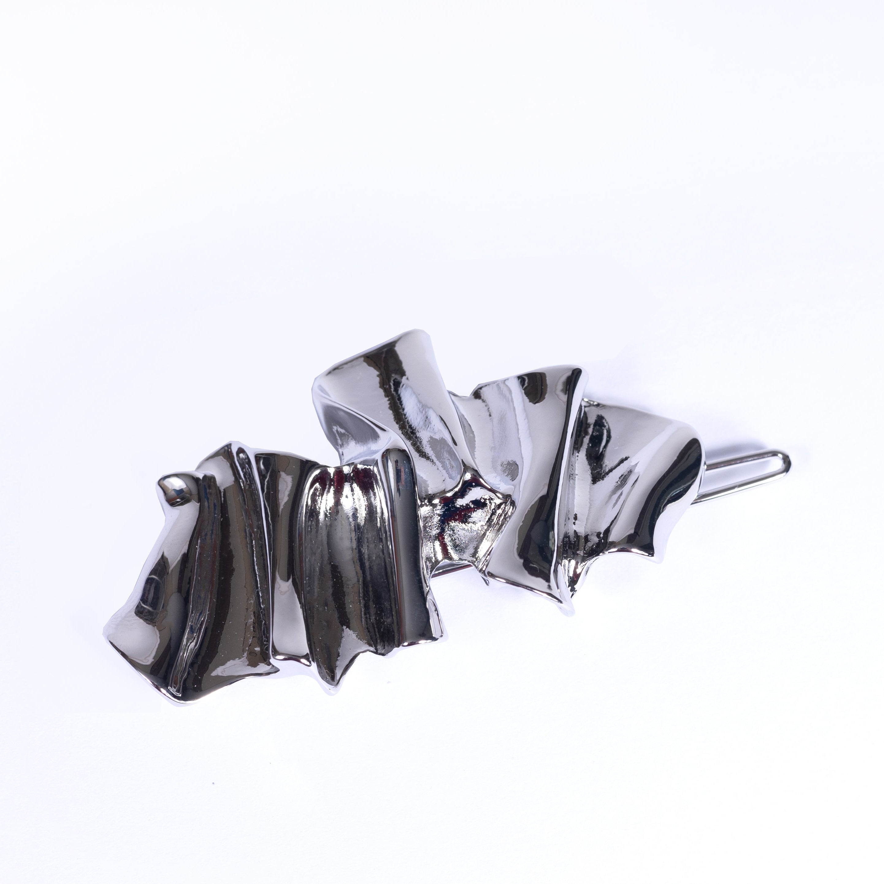 Silver clip on a white background